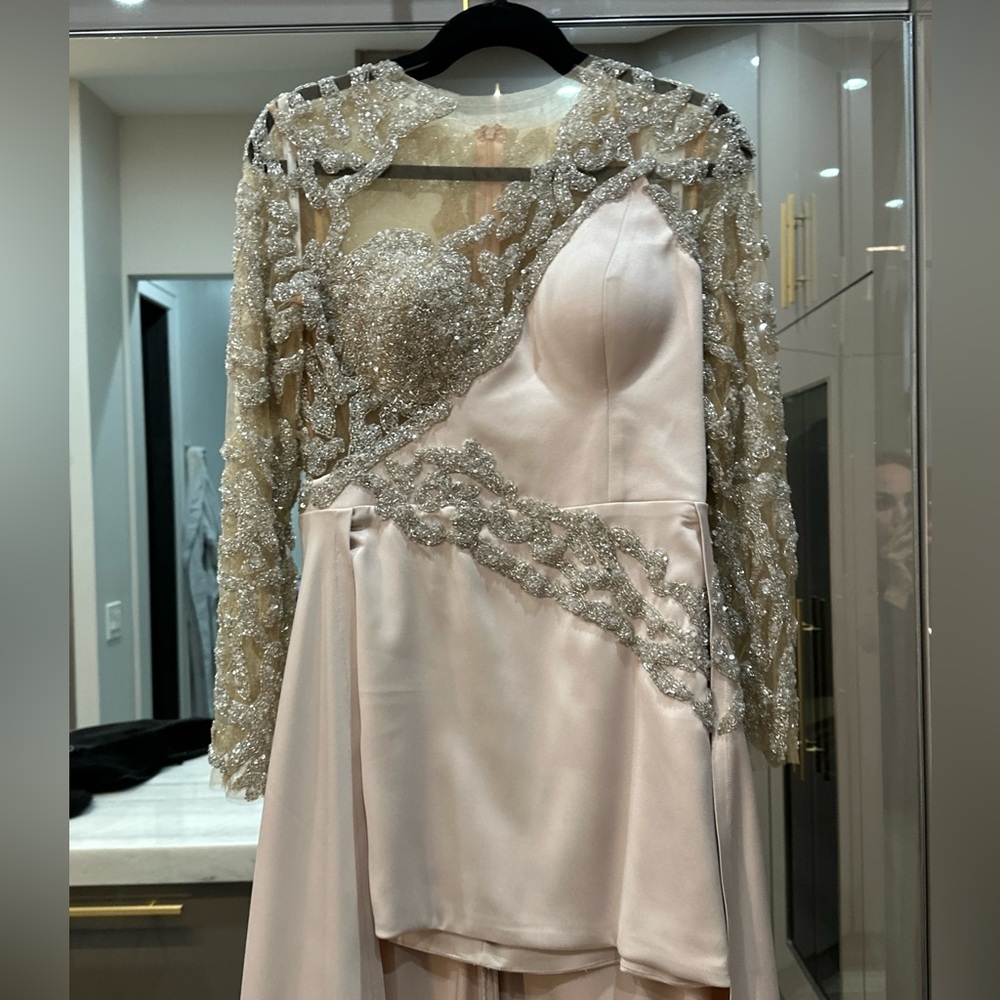 custom-made dress by Tabja from Kosovo the idea was taking Tony Ward Couture